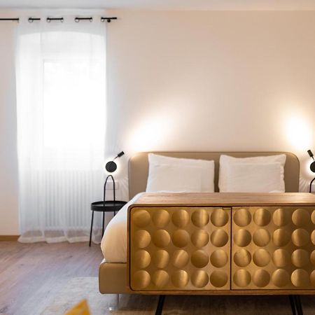Guesthouse Diwine Meran Exterior foto A bedroom