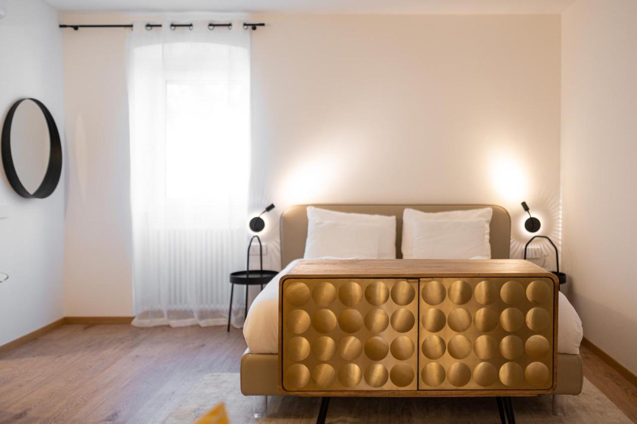 Guesthouse Diwine Meran Exterior foto A bedroom